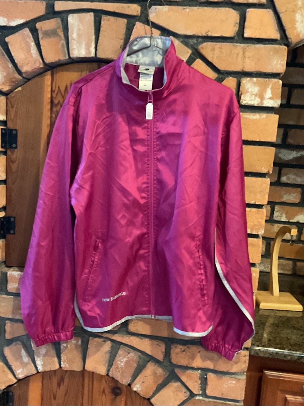 New Balance womens Magenta Lightweight Windbreaker